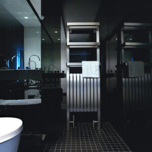 Attractive floor-standing designer towel rail for bathrooms