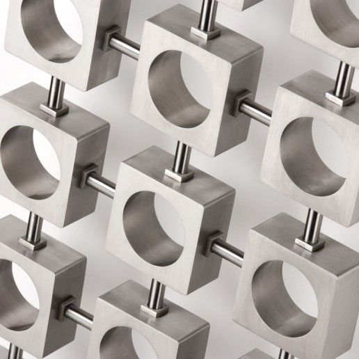 Close-up photo of AEON Lokum radiator in Brushed Matt Stainless Steel finish